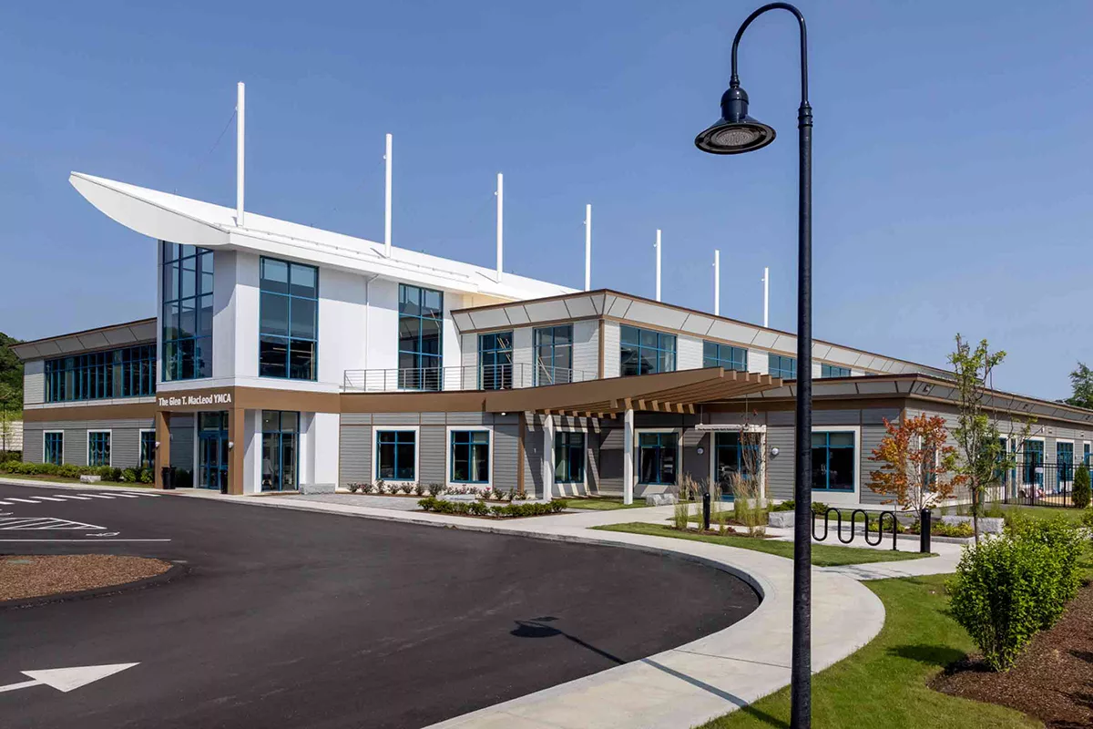 An exterior photo of the white and brown Glen T. MacLeod Cape Ann YMCA